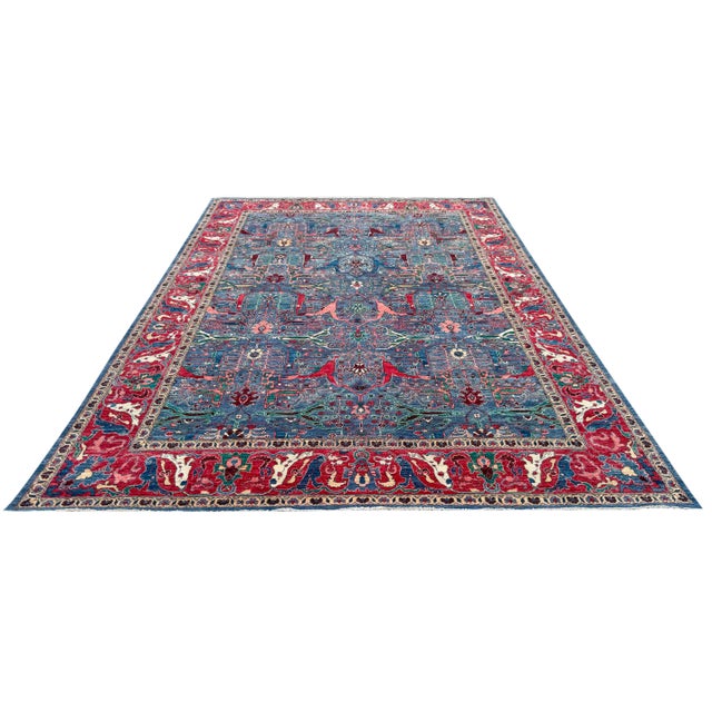 Make a grand statement in your home with this exquisite hand-knotted Persian-style rug, featuring an intricate floral...