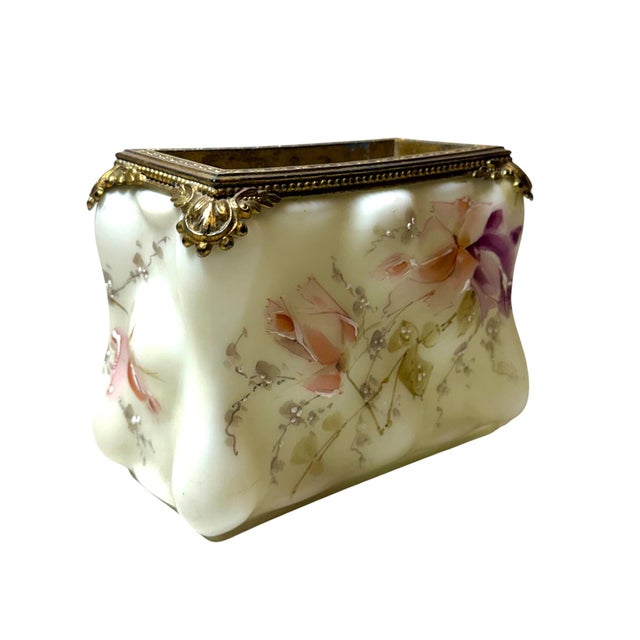 A decorative Wavecrest letter holder, crafted in the early 20th century and showcasing the refined artistry for which...