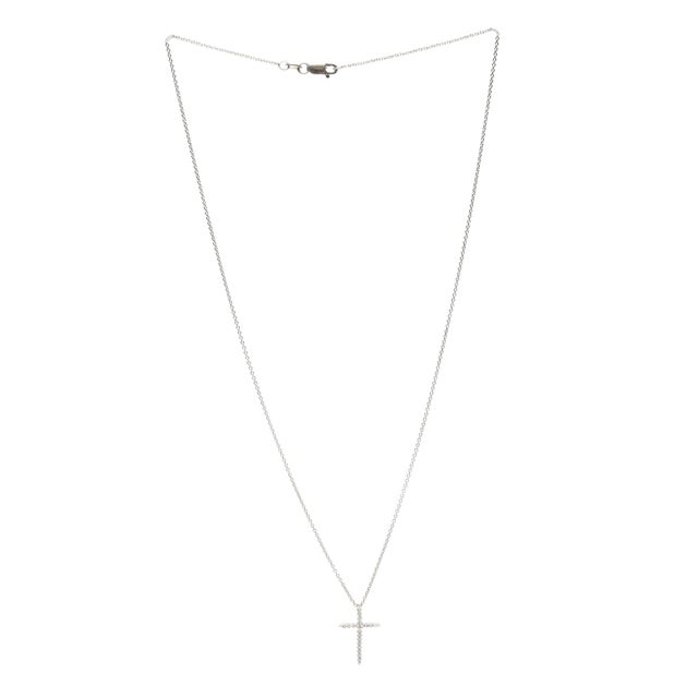 Stones: diamonds round brilliant approximately .10 total carats G-H color, VS1-2 clarity Length: 16 in. Pendant Length:...