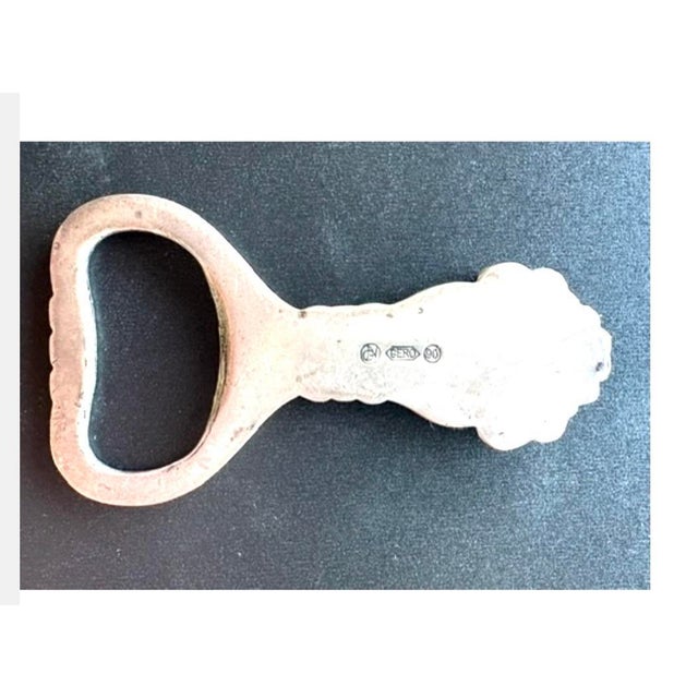 Not new. Art Deco. Silver plate. Rare Georg Nilsson Gero 90 Art Deco Style Bottle Opener - Orchid Motif A vintage silver-...