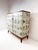 1940’s Swedish Cabinet later papered with illustrations by C.A. Lindman book Nordens Flora. Cabinet consists of large...