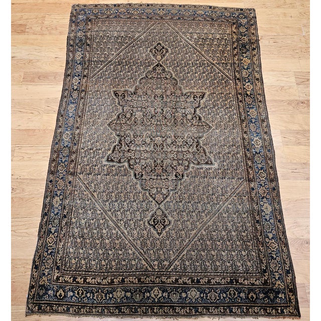 "An exceptional 19th century Persian Senneh rug, masterfully hand-knotted in a Kurdish village of western Persia in the...