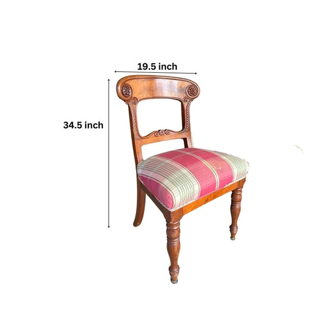 Set of 2 custom upholstered plaid chairs with wood bases. The chairs have big cushy seats super comfy! The chair on the...