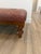 A great versatile tufted leather bench or ottoman that also could work well as a coffee table. Put your feet up to relax...