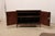 A French two-door chest, with it's original marble top, from the early 19th century. This antique chest from France...