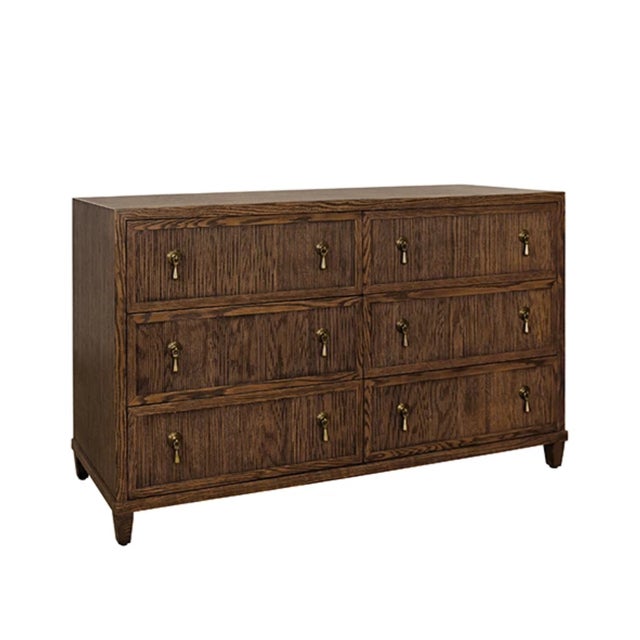 Timeless elegance meets practical storage in this six-drawer chest. Crafted in warm provincial brown oak, each drawer...