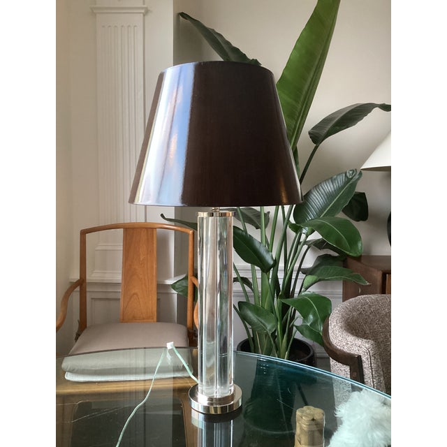 A striking and substantial table lamp by J. Robert Scott, showcasing the brand's signature blend of timeless luxury and...