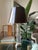 A striking and substantial table lamp by J. Robert Scott, showcasing the brand's signature blend of timeless luxury and...
