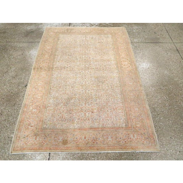 This Mid-20th century Turkish Sivas rug, measuring 4' 0" x 5' 9", displays the refined artistry and elegance for which...