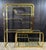 This adjustable golden brass and glass etagere by Milo Baughman for the Design Institute of America is one of the more...
