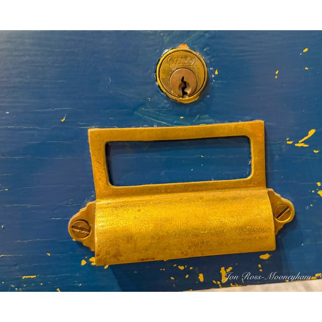 Vintage school or lab table with 2 front drawers, painted bright yellow with 2 front drawers painted blue and orange....