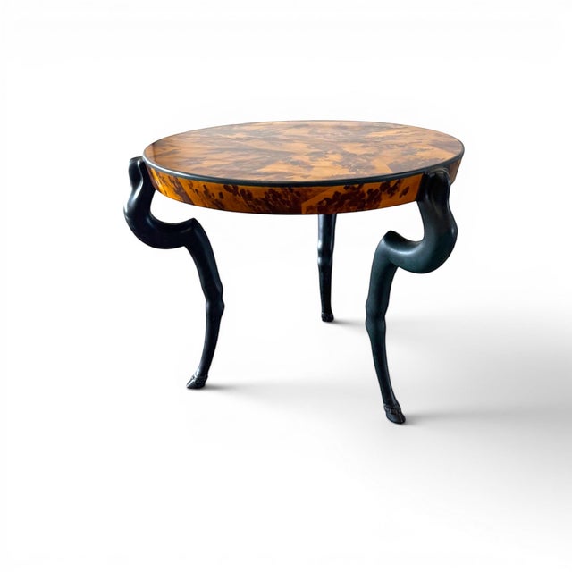 Rare sculptural center table by Sirmos, showcasing the company’s iconic stylized goat-leg form associated with their...