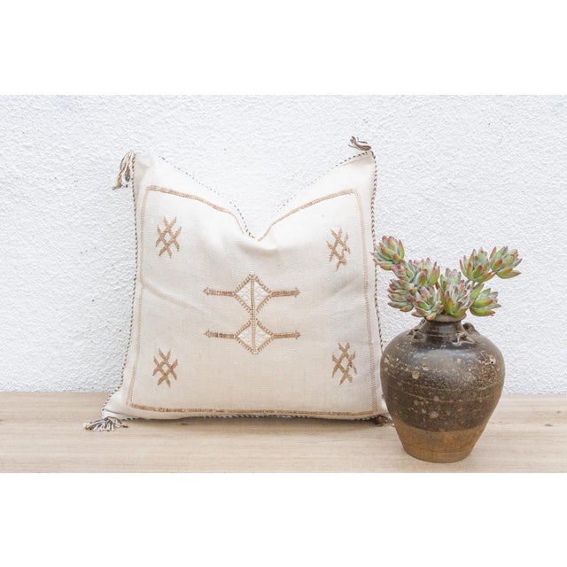 Introduce a touch of organic artistry to your home with our handcrafted 18-inch square cactus silk pillow cover. Woven...