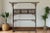 Finely carved Chinese clothes rack, inspired by the elegant aesthetics of the Qing Dynasty. The rack boasts a distressed...