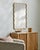 This Ismenia mirror offers a mid-century modern style with subtle visual elements that will enhance your home. Its sleek...