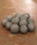 Full of authentic French sporting character, this antique set of traditional boules includes 12 large wooden playing balls...