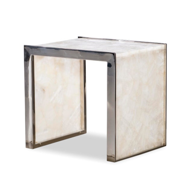 Glassy white quartz with polished stainless steel trim