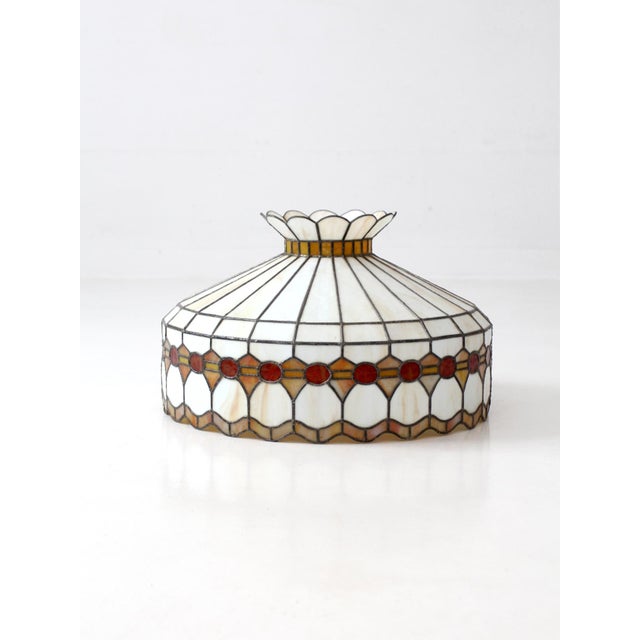 Vintage Tiffany-style stained glass hanging lamp shade featuring leaded glass construction with creamy opalescent panels,...