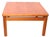 Classic Mid Century Danish Modern by Trioh, circa 1970's. The table features a square floating top, with round dowel form...