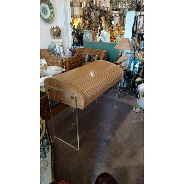 Vintage Vladimir Kagan roll top desk with lucite legs. Model P902. Desk has a leather work top and drawer. Unmarked