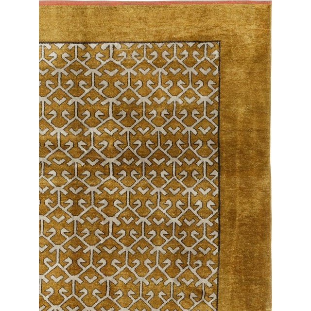 This Mid-20th century Turkish Anatolian square room-size carpet presents a disciplined allover composition in warm golden...