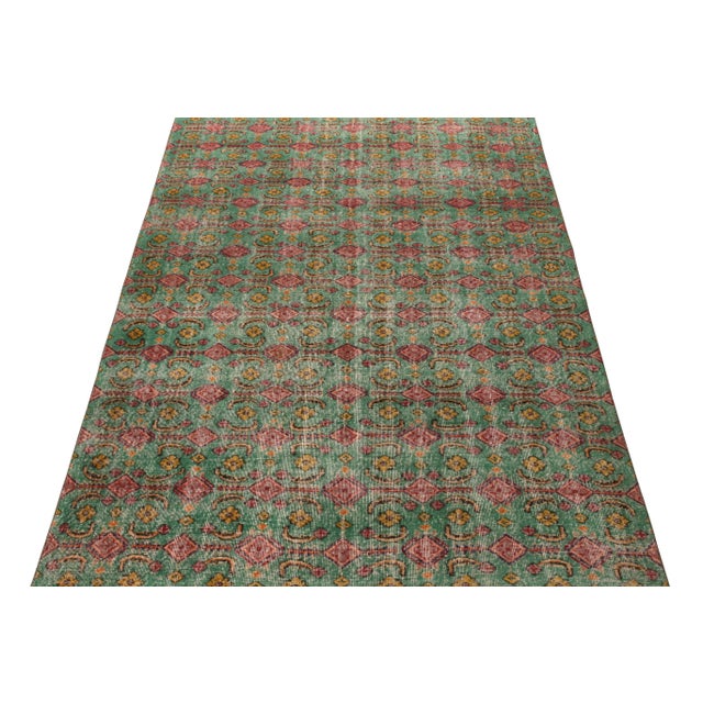 A vintage 6x9 distressed Art Deco rug, hand-knotted in wool circa 1960-1970. Joining Rug & Kilim’s Mid-Century Pasha...