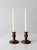 This is a pair of vintage wooden candlesticks. The turned wood candle holders fit a standard taper.
