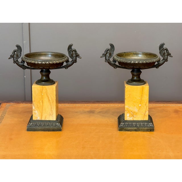 Pair of early 19th C. French patinated bronze tazzas, the shallow circular bowls with beaded rims over egg-and-dart...
