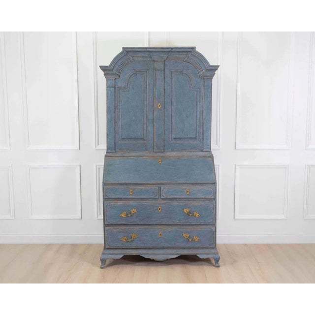 An exceptional 17th century Scandinavian bureau featuring a striking blue painted finish and original hardware. Rich in...