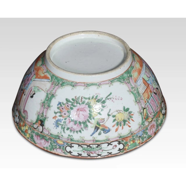 Late 19th-century Cantonese famille rose bowl, typically decorated in famille rose palette with panels of figures, flowers...