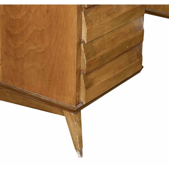 Mid-century wood desk is an original design furniure item realized in the mid-20th century and attributed to Melchiorre...