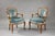 Two rococo style armchairs, characterized by lightness and movement. Their sinuous and asymmetrical shape reflects the...