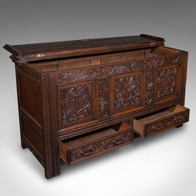 This is a large antique mule chest. An English, carved oak coffer, dating to the late 17th century, circa 1700. Superb...