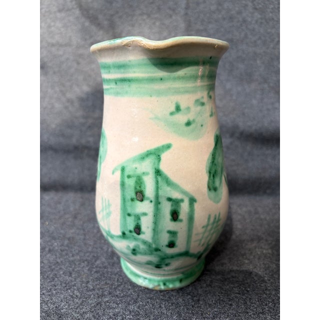Vintage hand painted scenic, folk art, stoneware pitcher, jug. Made in Italy. Pitcher measures 5 1/2" by 4" by 7". .