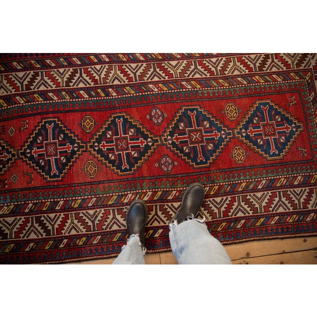 :: Single column stepped center medallions atop a partially covered field of animals and minor geometric guls with...