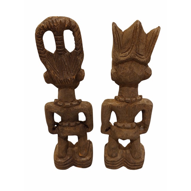 Wooden Male and Female Ibeji Twin Figures Carved by the Yoruba people of Nigeria Dimensions: Height- Approx 12 inches;...