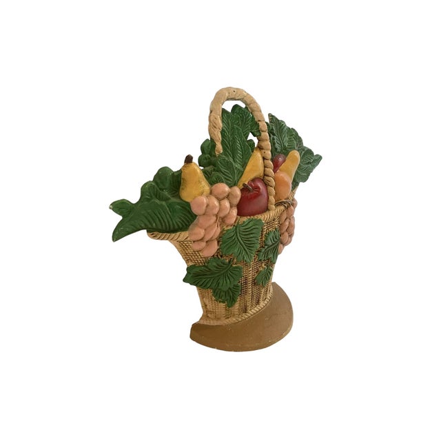 Lovely cast iron doorstop of a basket of fruit. Victorian and antique in style. It is in very nice condition. It does have...