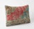 This beautiful 16'' x 24'' pillow cover was made from an authentic Turkish rug. Bright colors of wool adorn the front of...