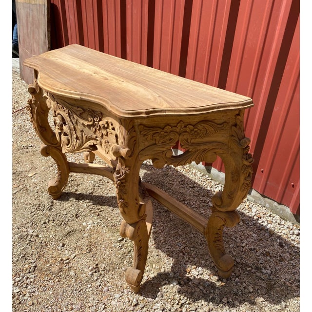 Incredibly beautiful hand carved wood console table. I’ve taken close up pictures to show the workmanship & details. No...