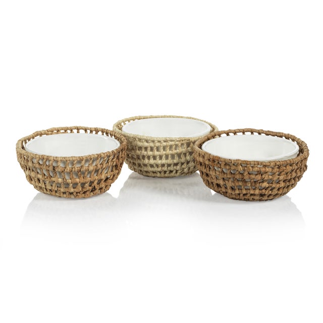 Woven together with raffia, lupis, bangkuan fibers, these bowls are a natural work of art. Handcrafted in 3 different...