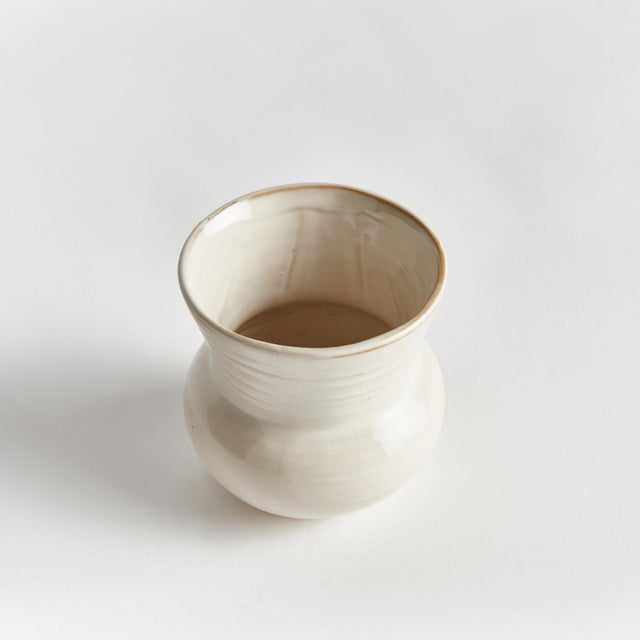 What makes this pot unique is the deep, aqueous reactive glaze. Made of a highfired stoneware, the rich depth of color is...