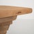 A Brutalist oak dining table featuring a thick top and solid supporting legs. The table is defined by its heavy...