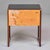 In the tradition of Danish Mid-Century cabinetmaking, this side table by Langkilde features richly figured rosewood...