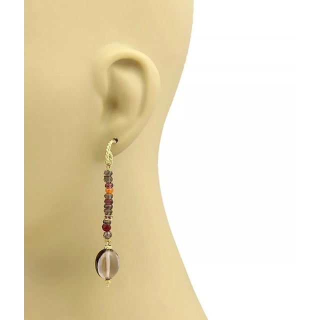 This is a beautiful authentic pair of earrings from David Yurman, it is crafted from 18k yellow gold. The top stud part is...