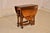 Period Edwardian walnut drop-leaf side table from England. The table has a richly grained top, following down to a simple...