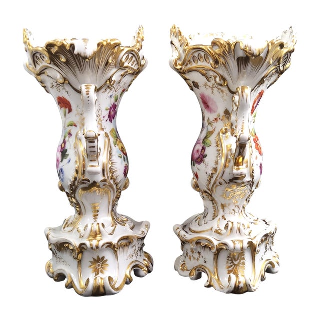 An exceptional pair of french hard-paste porcelain rococo revival vases, produced at the jacob petit manufactory in...