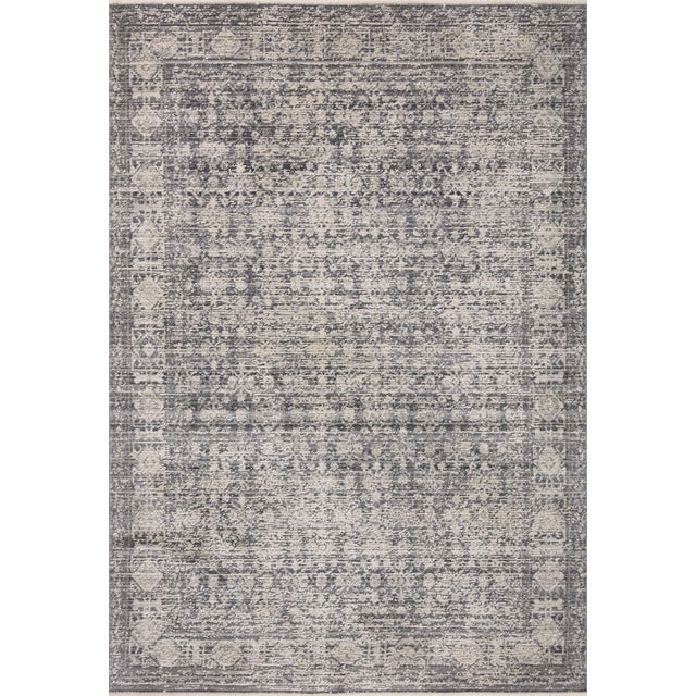 Area rugs in the Alie Collection have an elevated antique look and plush, modern feel. The rug’s underlying traditional...