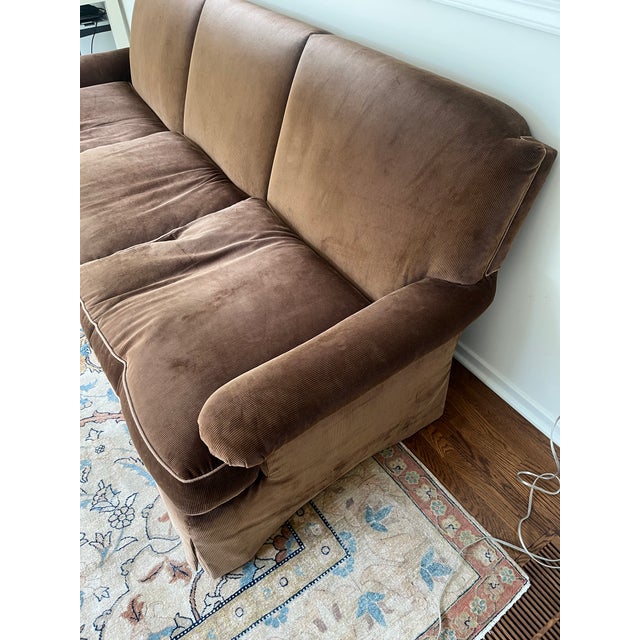 Beautiful English roll arm / Charles of London–style sofa upholstered in luxurious Holland & Sherry corduroy in a rich...
