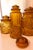 1960s Mid-Century Modern Le Smith Moon & Star Amber Glass Cannister Graduated in Size Cottage - Set of 4 For Sale - Image 9 of 12
