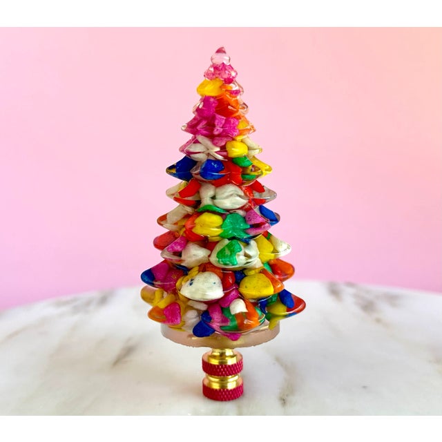 Add an unexpected pop of holiday cheer to the top of your favorite table lamp with this designer lamp finial, hand-crafted...